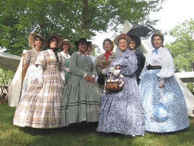 Ladies dressed in Civil War era dresses at Camp Maxwell